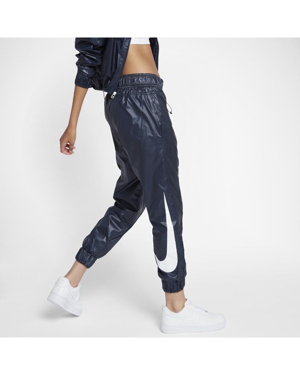 Nike Synthetic Sportswear Swoosh Women's Woven Pants in Blue | Lyst