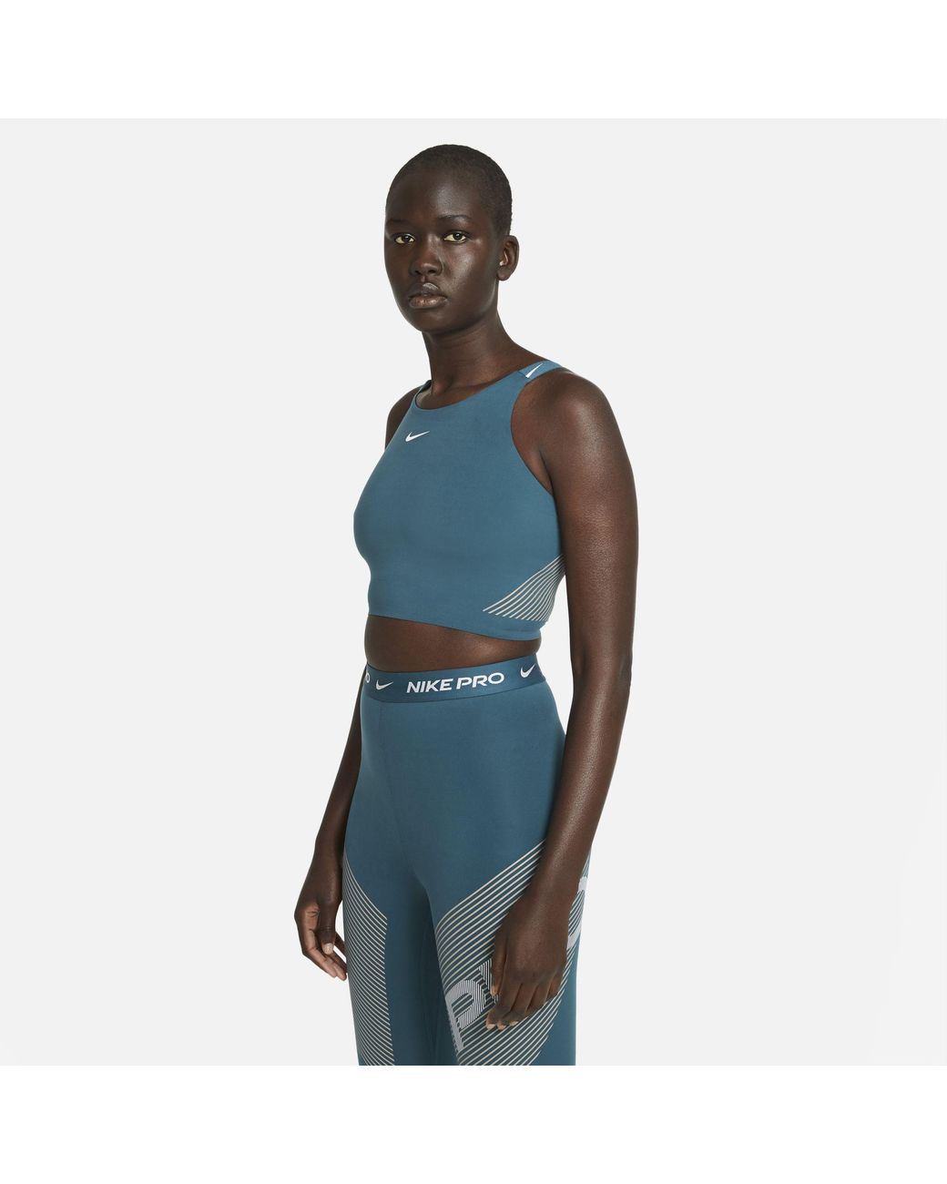 Nike Pro Dri-fit Women's Shelf-bra Cropped Tank | Lyst