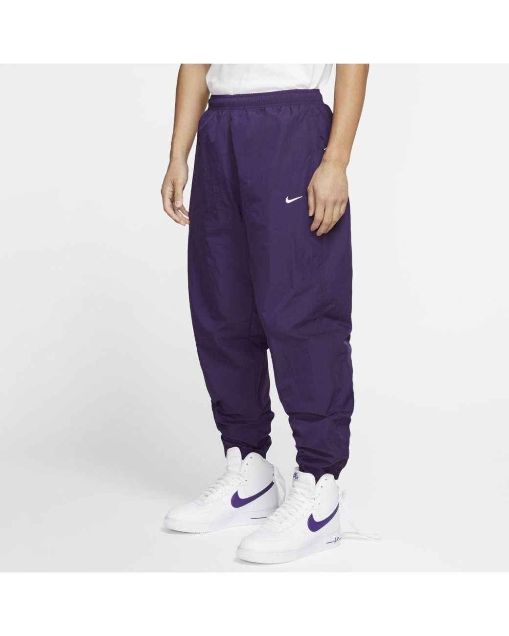Nike Nrg Tapered Logo-embroidered Shell Track Pants in Purple for Men | Lyst