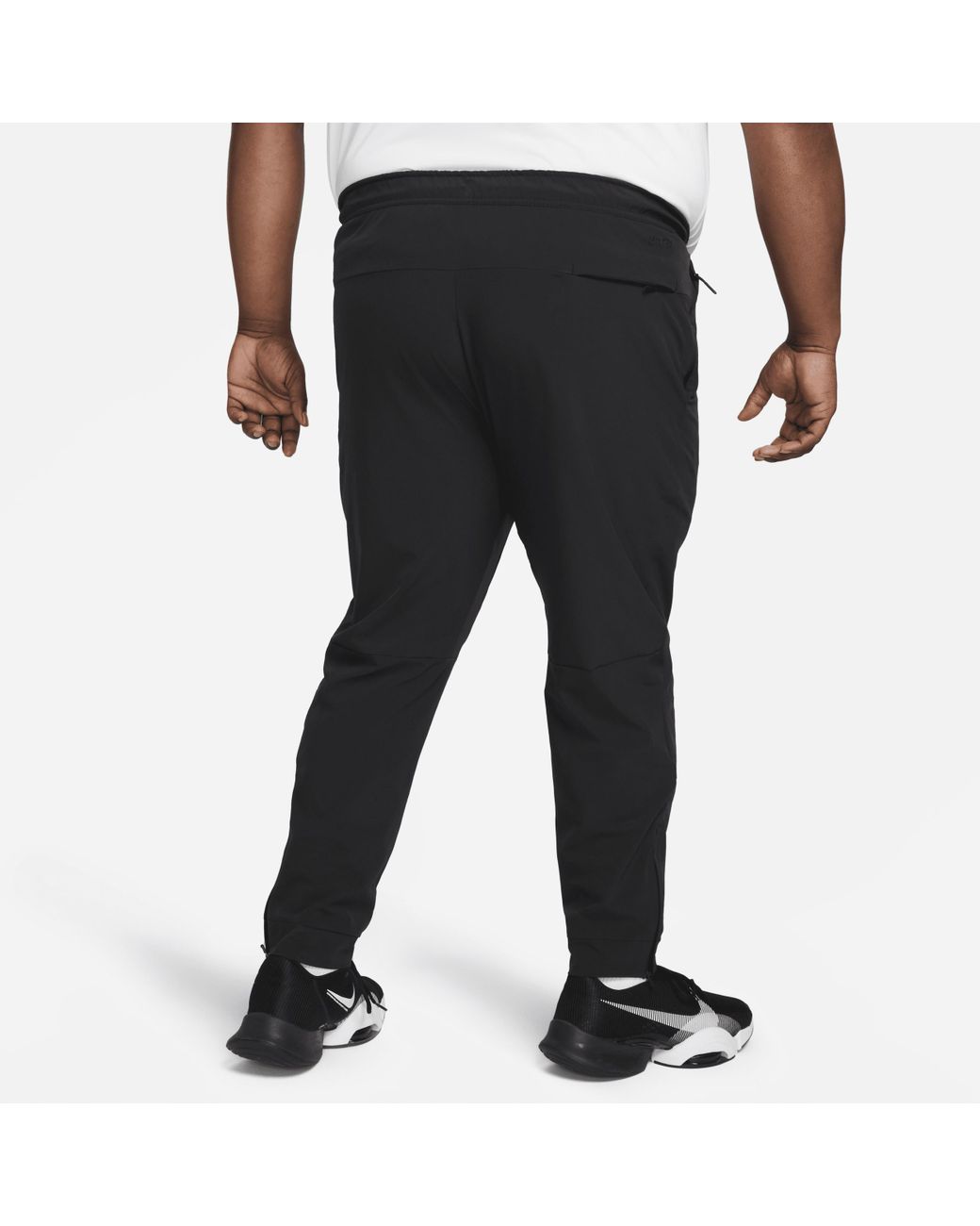 Nike Unlimited Dri-fit Zippered Cuff Versatile Pants in Black for