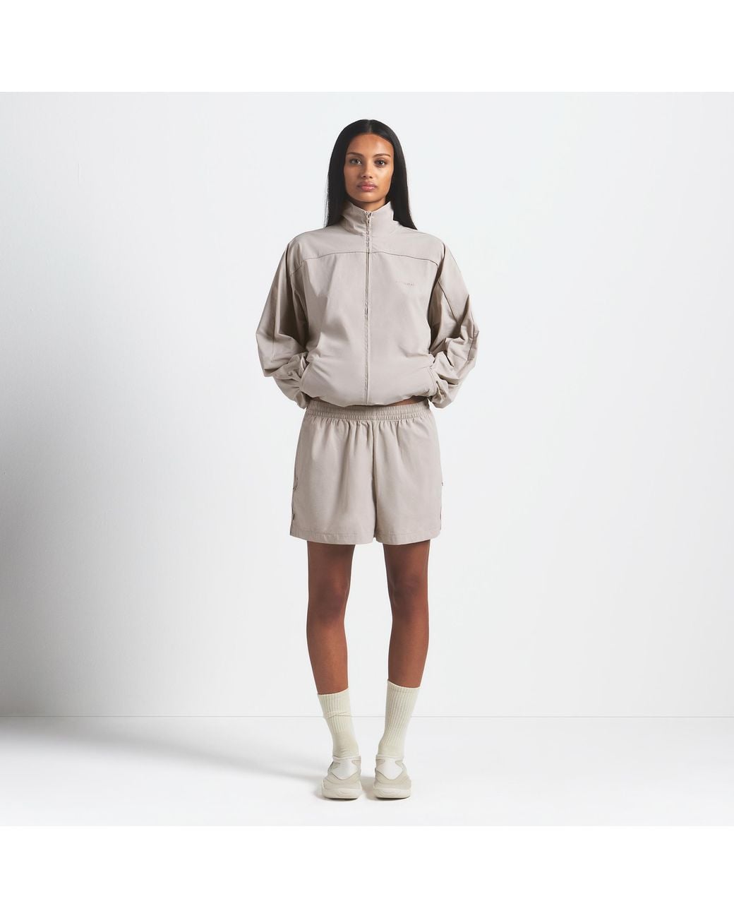 Nike Skims Woven Nylon Oversized Track Jacket in Natural | Lyst