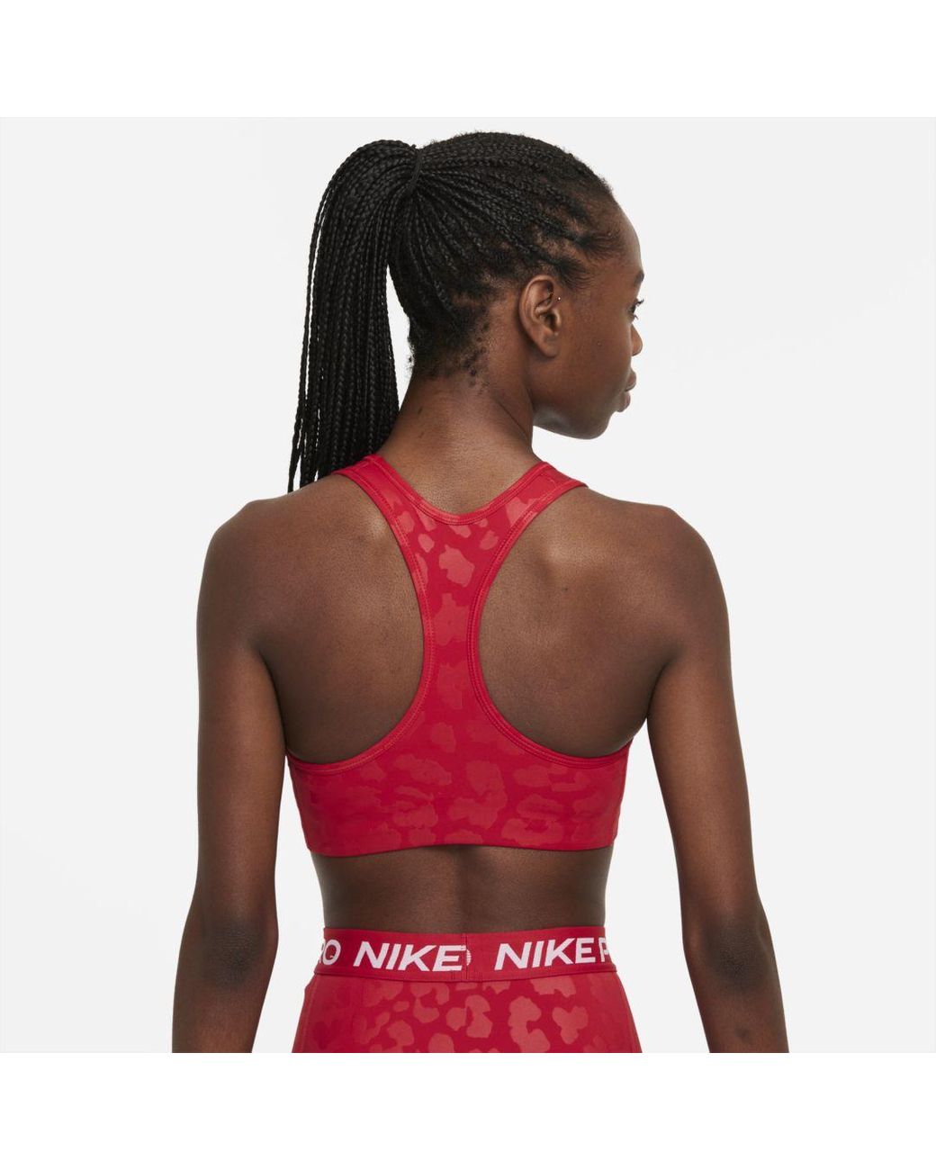 Nike Pro Dri-fit Swoosh Women's Medium-support Leopard Sports Bra in Red