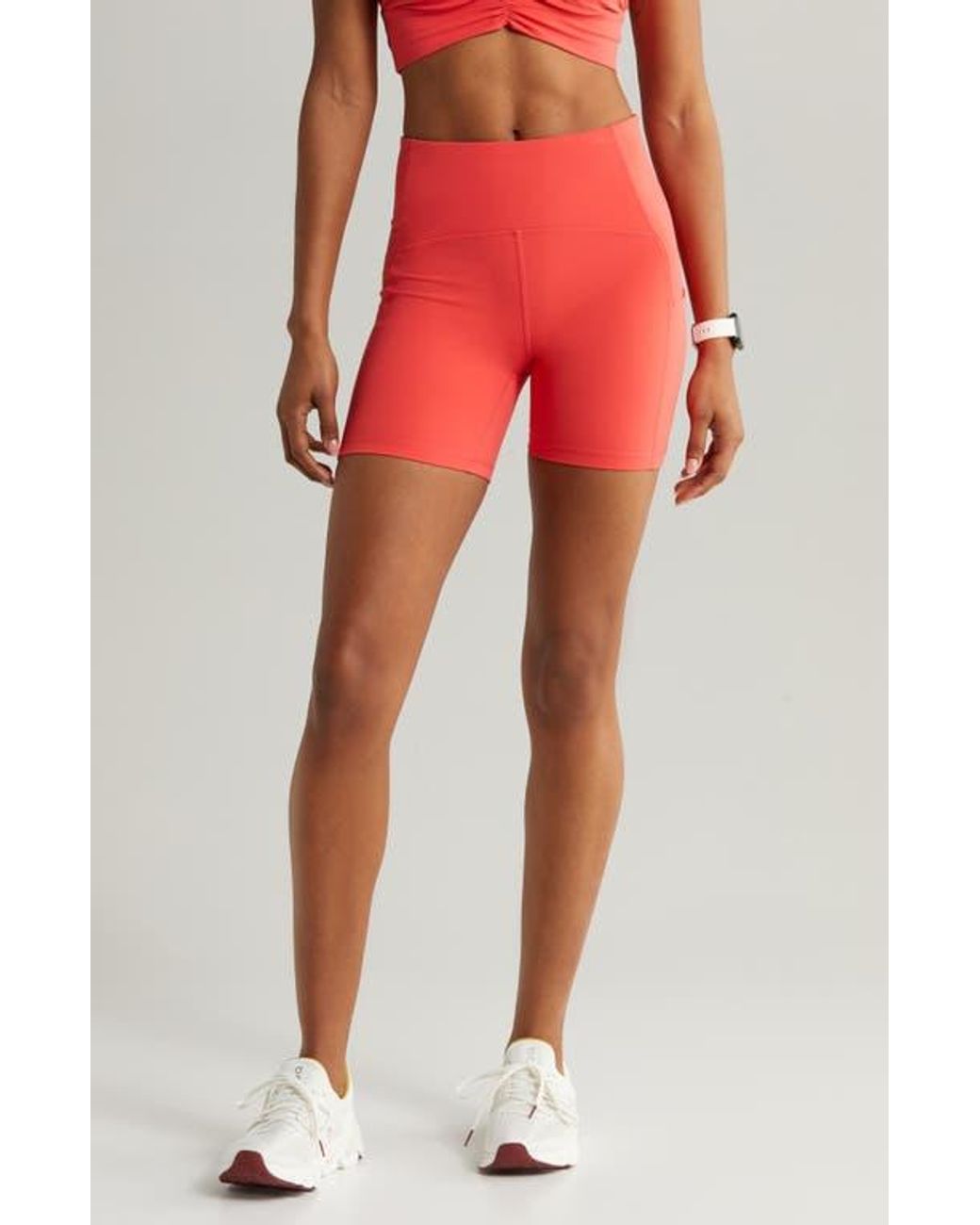 Zella Moisture Wicking Pocket Bike Shorts in Orange Lyst