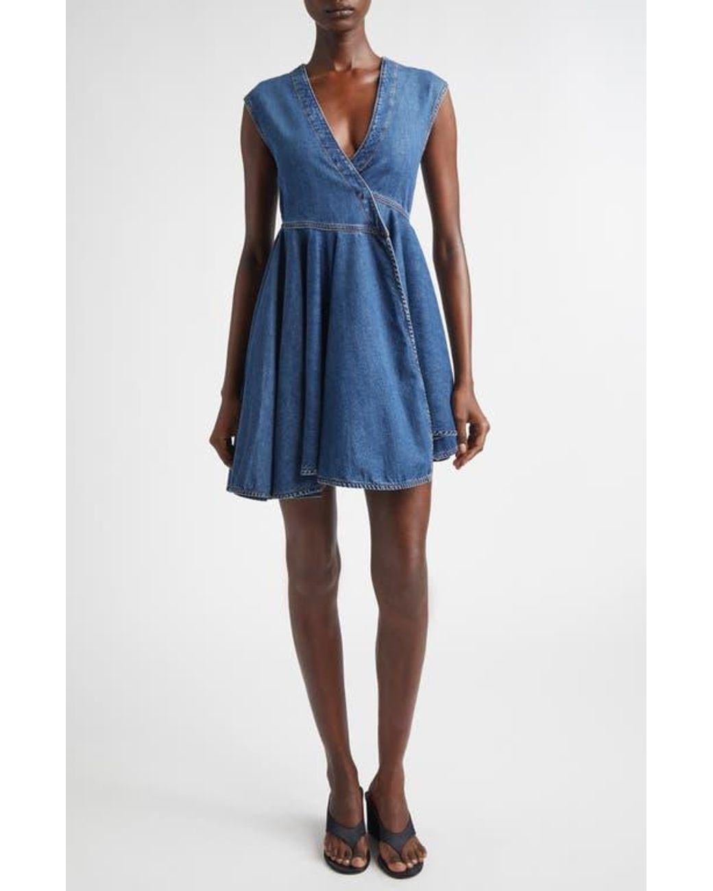 alaia belted denim midi wrap dress Alaa Denim Midi Dress