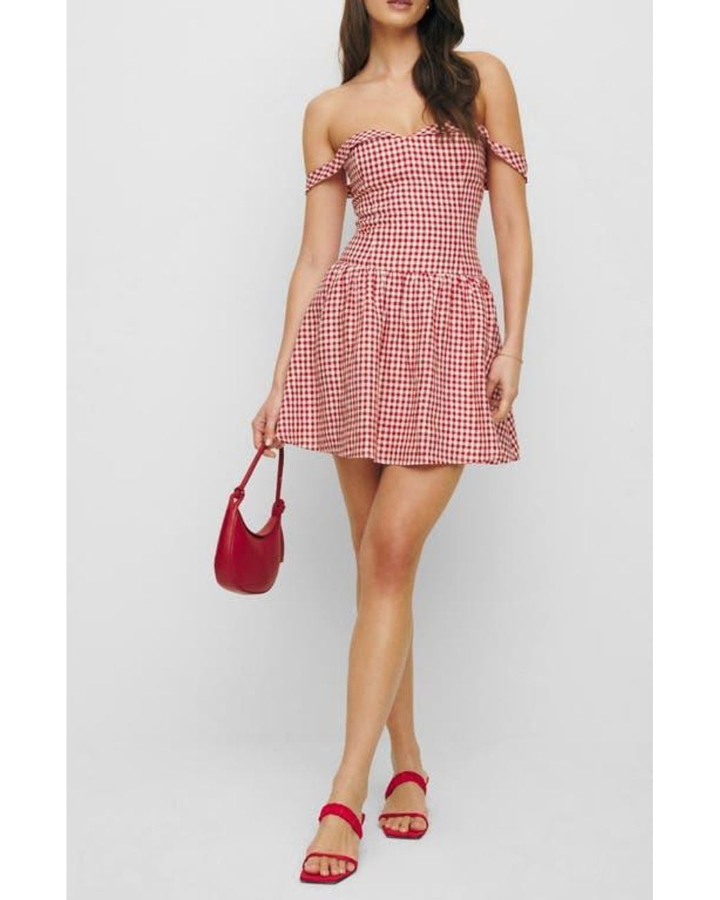 reformation gingham dress Gemini a round neckline Reformation Sora Gingham Off The