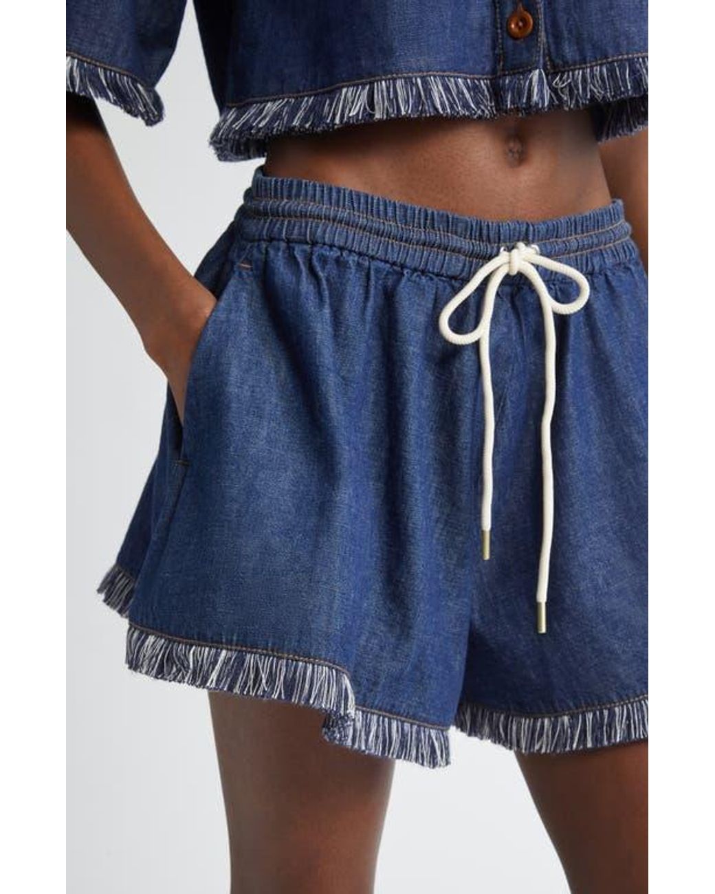 Zimmermann Rhiannon Drawstring Waist Fringe Hem Denim Shorts in