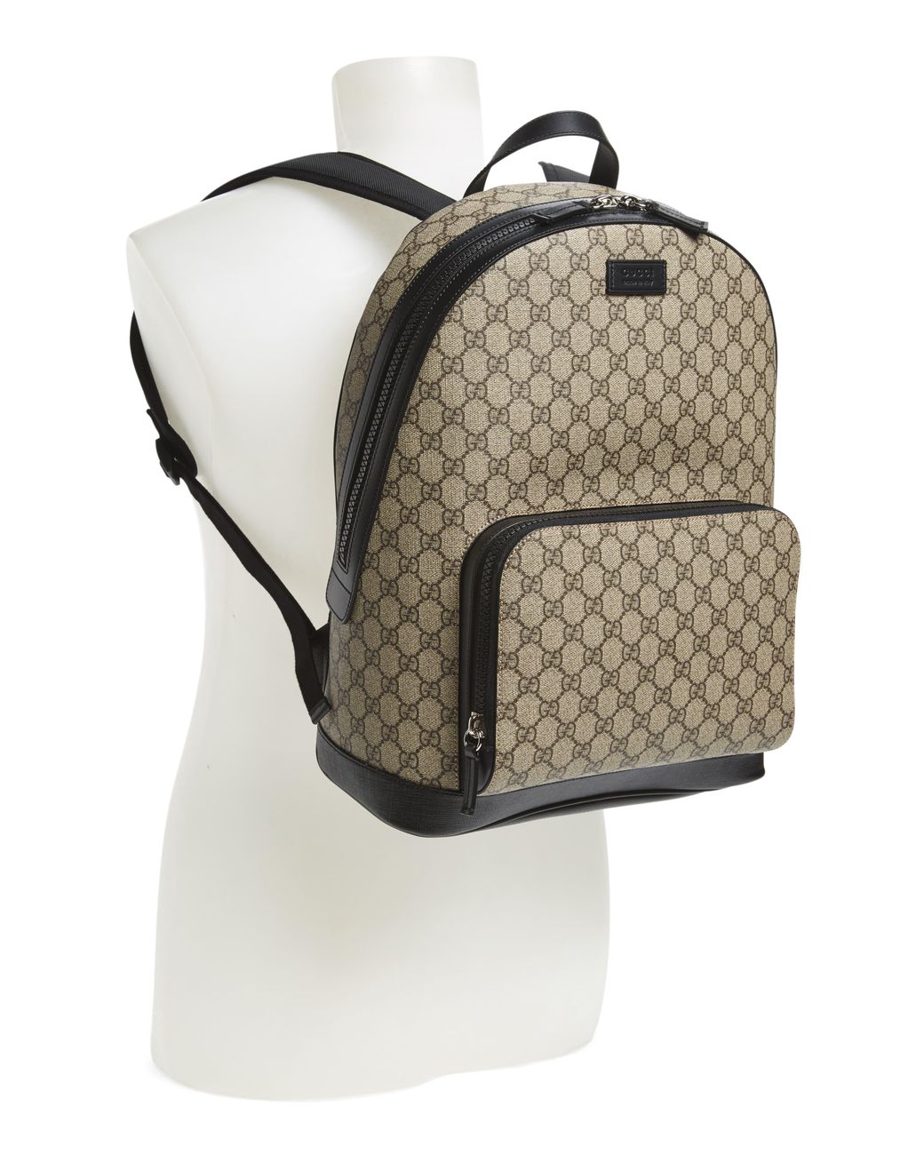 beige canvas backpack