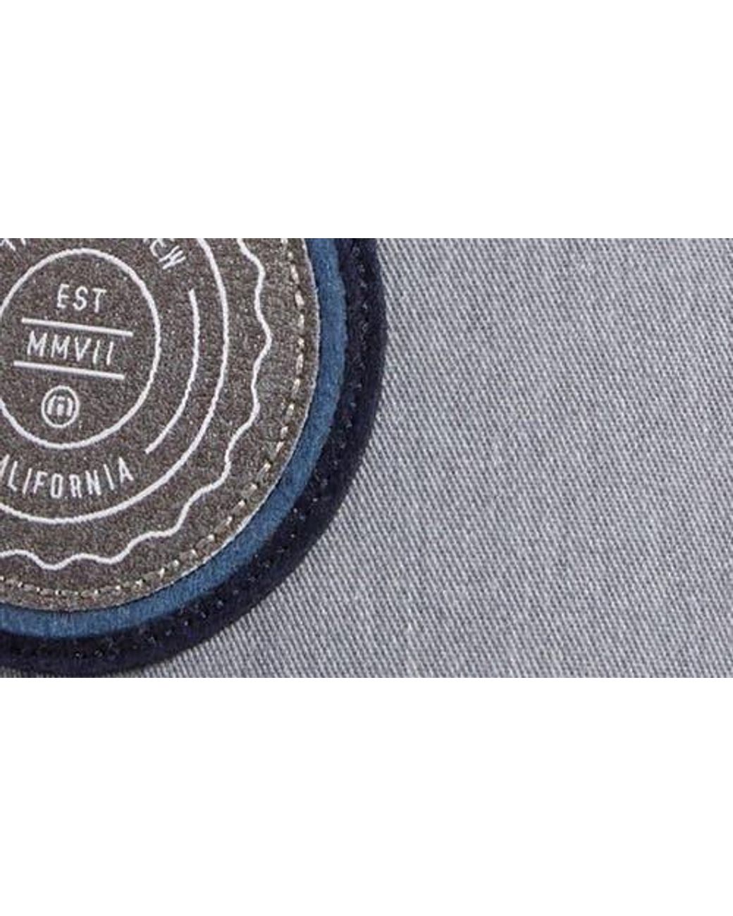 Travis Mathew Black The Patch Trucker Hat for men