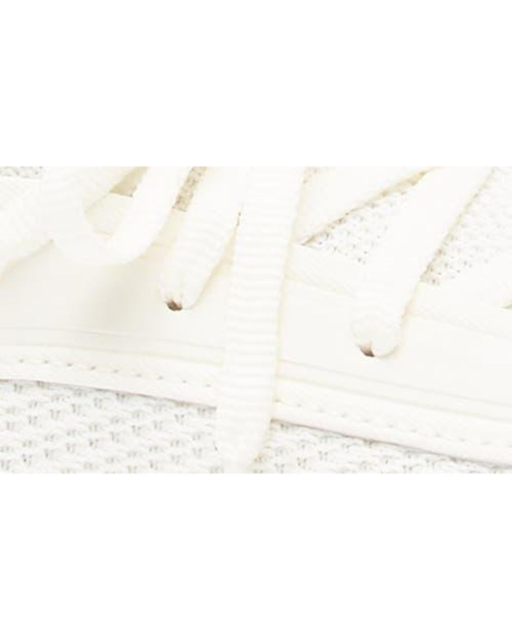 PUMA White Softride Ruby Luxe Sneaker