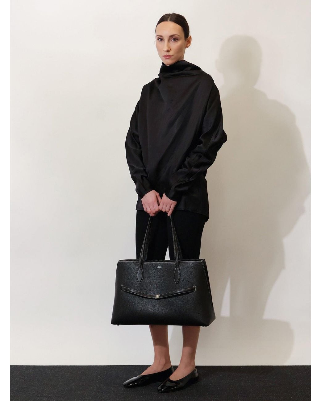 Totême  Black Leather Shoulder Bag With Lettering Logo On The Front