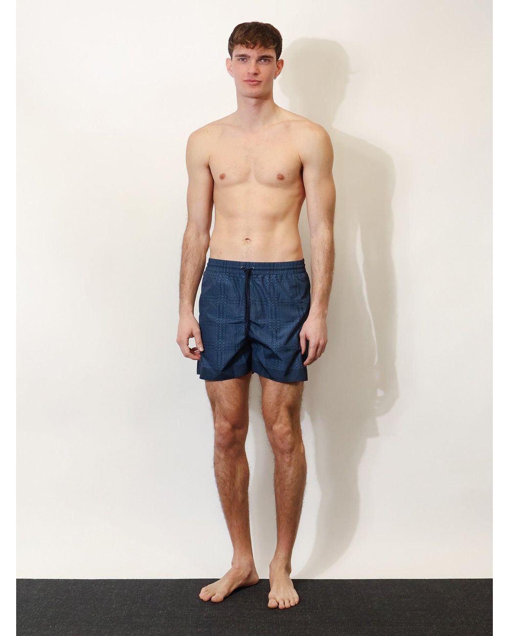 Nylon Swim Trunks With All-Over Incrocio Print-Uomo di Gucci in Blue da Uomo