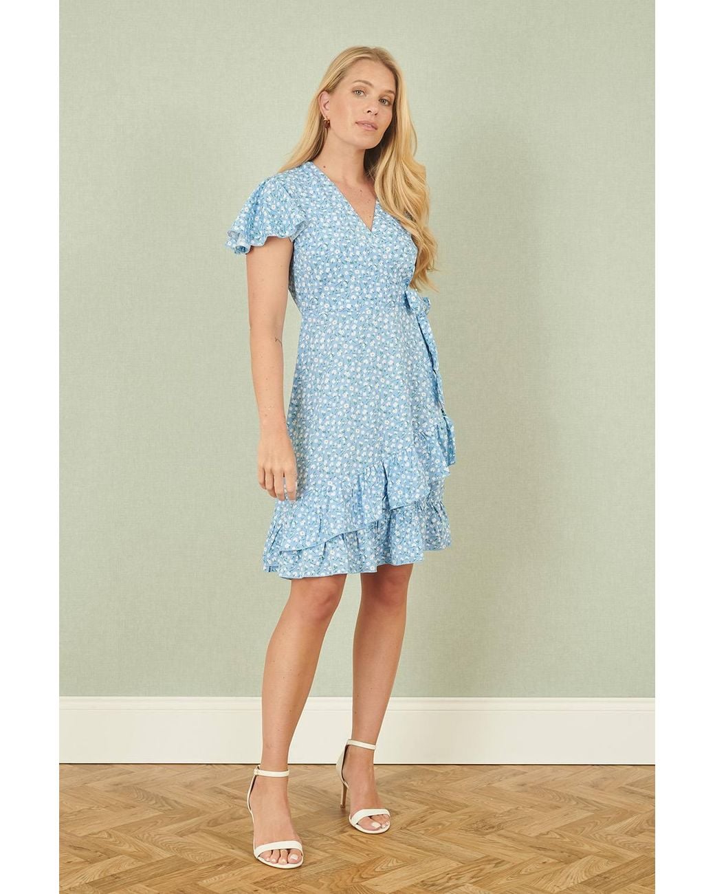 Yumi' Blue Ditsy Floral Wrap Frill Dress