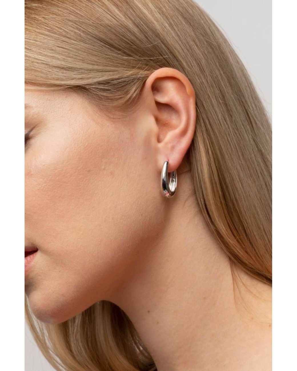 The Colourful Aura Brown Plain U Shape Geometric Oval Hoop Earring