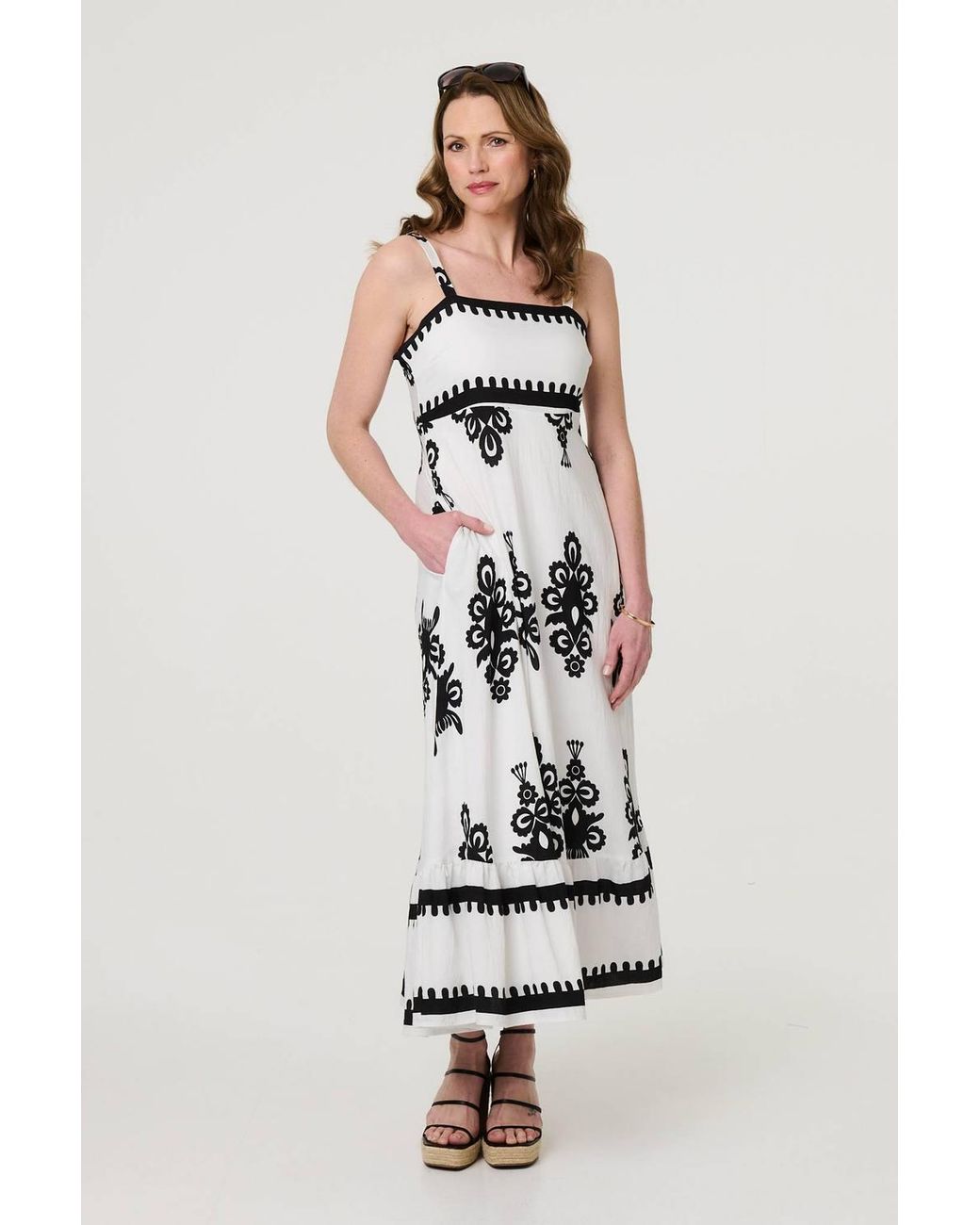 Izabel London White Ikat Print Sleeveless A-Line Maxi Dress