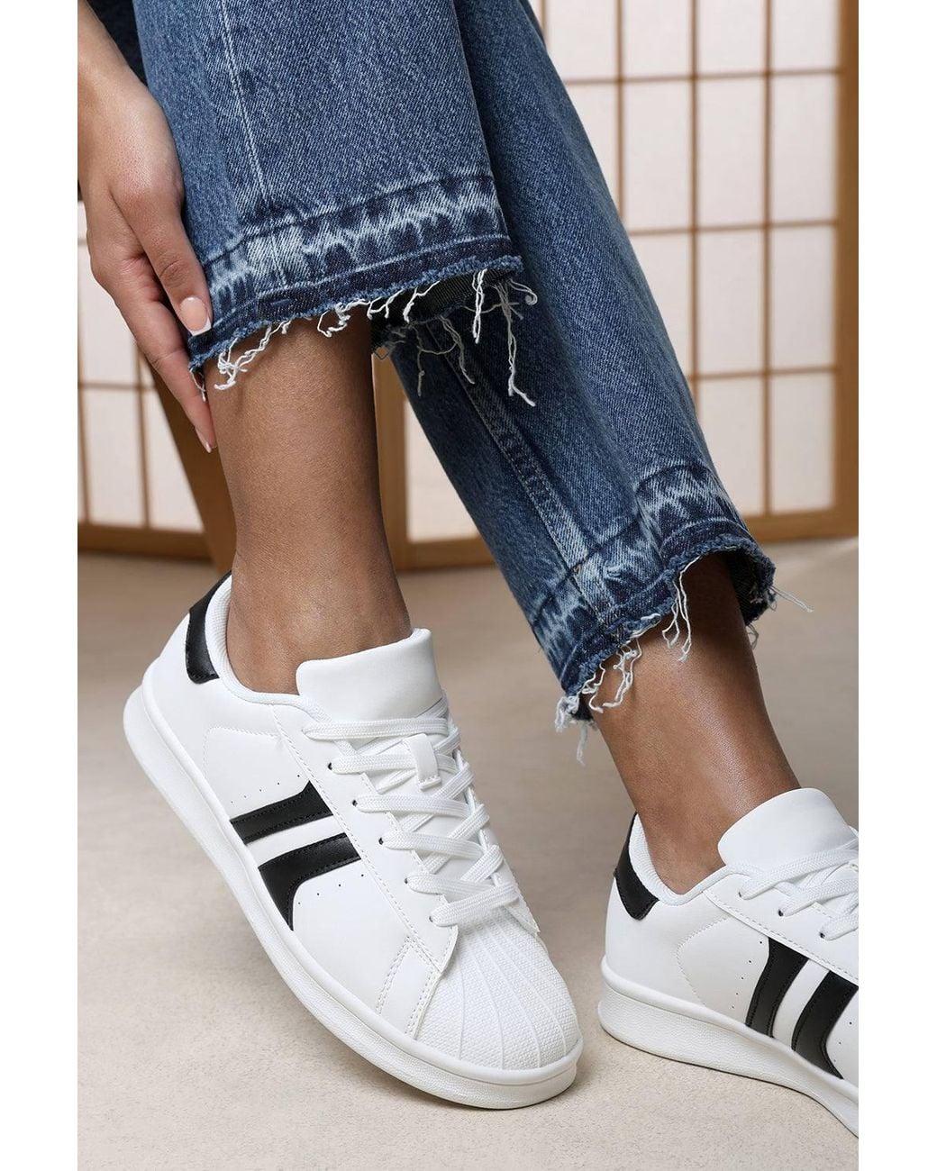 Where's That From Blue Yamileth Stripe Panel Detailed Trainer
