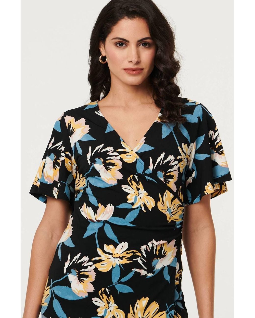 Izabel London Blue Floral Short Angel Sleeve Wrap Front Top