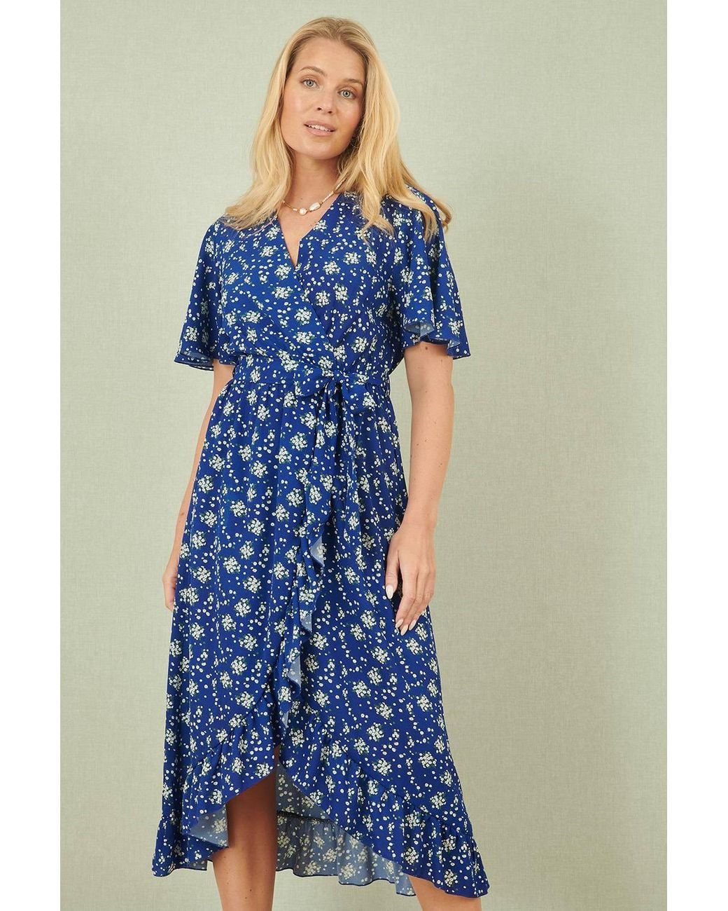 Yumi' Blue Floral Wrap Dress W/ Frill Hem