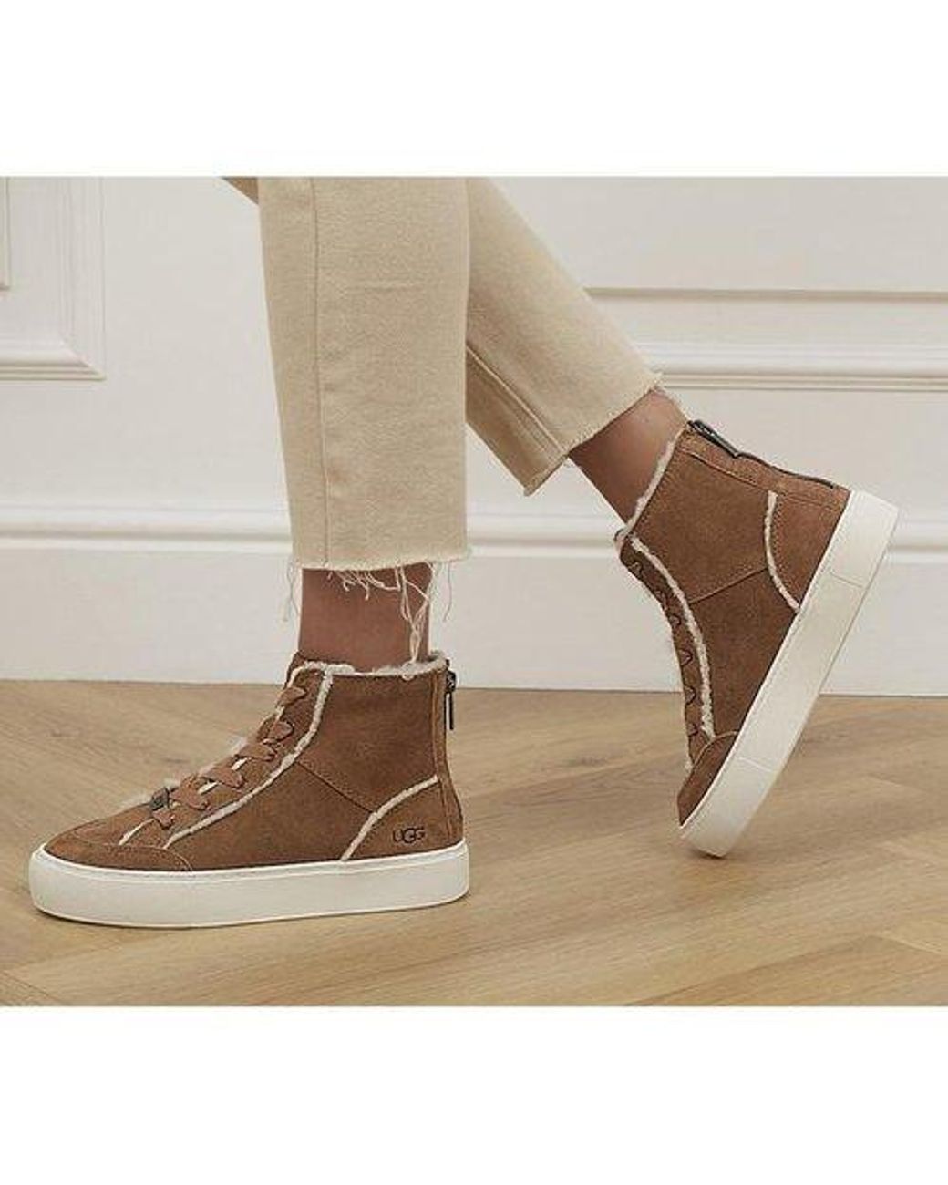 brown boot trainers