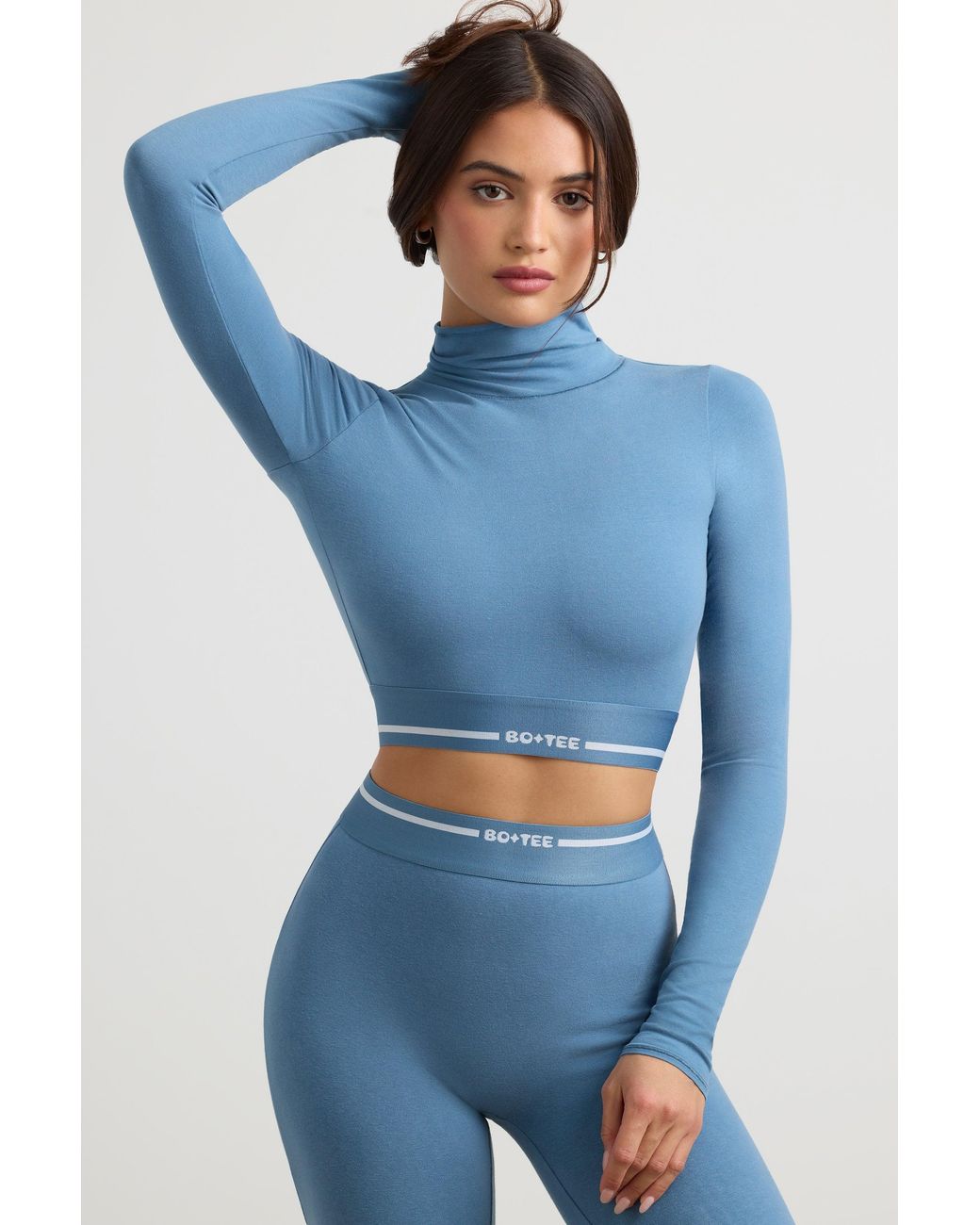 BO+TEE Blue Backless Turtleneck Long-Sleeve Crop Top