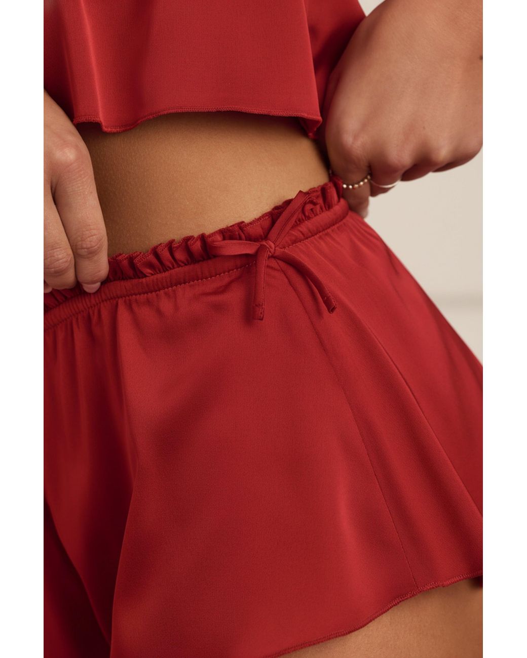 Oh Polly Mid-Rise Flared Shorts