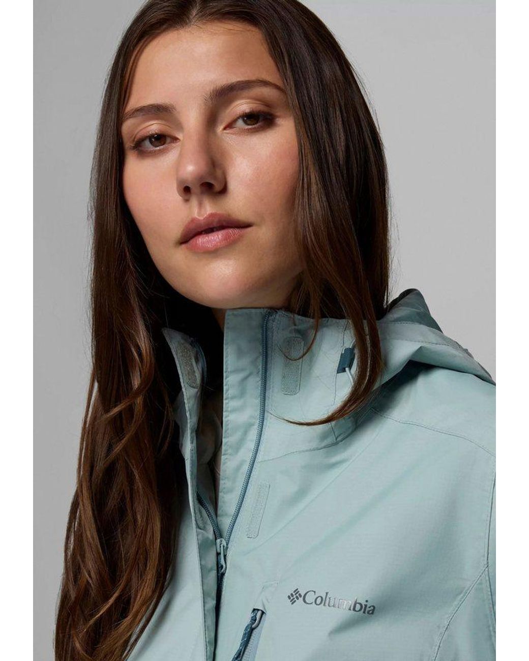 Columbia Blue Regenjacke Pouring Adventure Iii Jacket Mit Per Gummizug Verstellbarer Kapuze, Wasserdicht, Winddicht