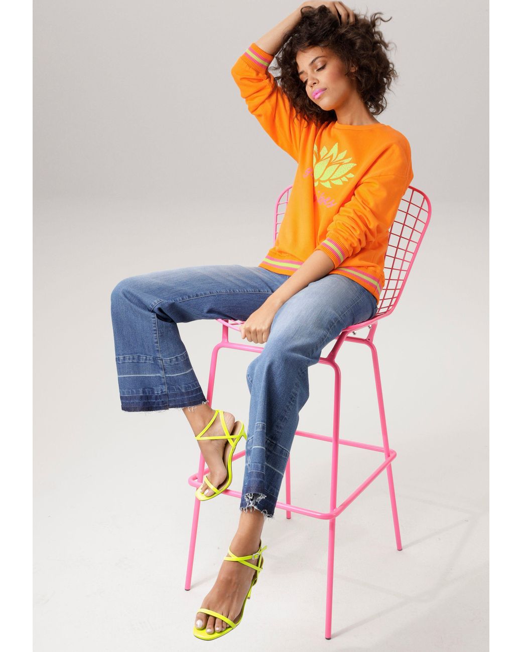 Aniston CASUAL Sweatshirt Frontdruck mit abstrakter Seerose und Schriftzug  in Orange | Lyst DE