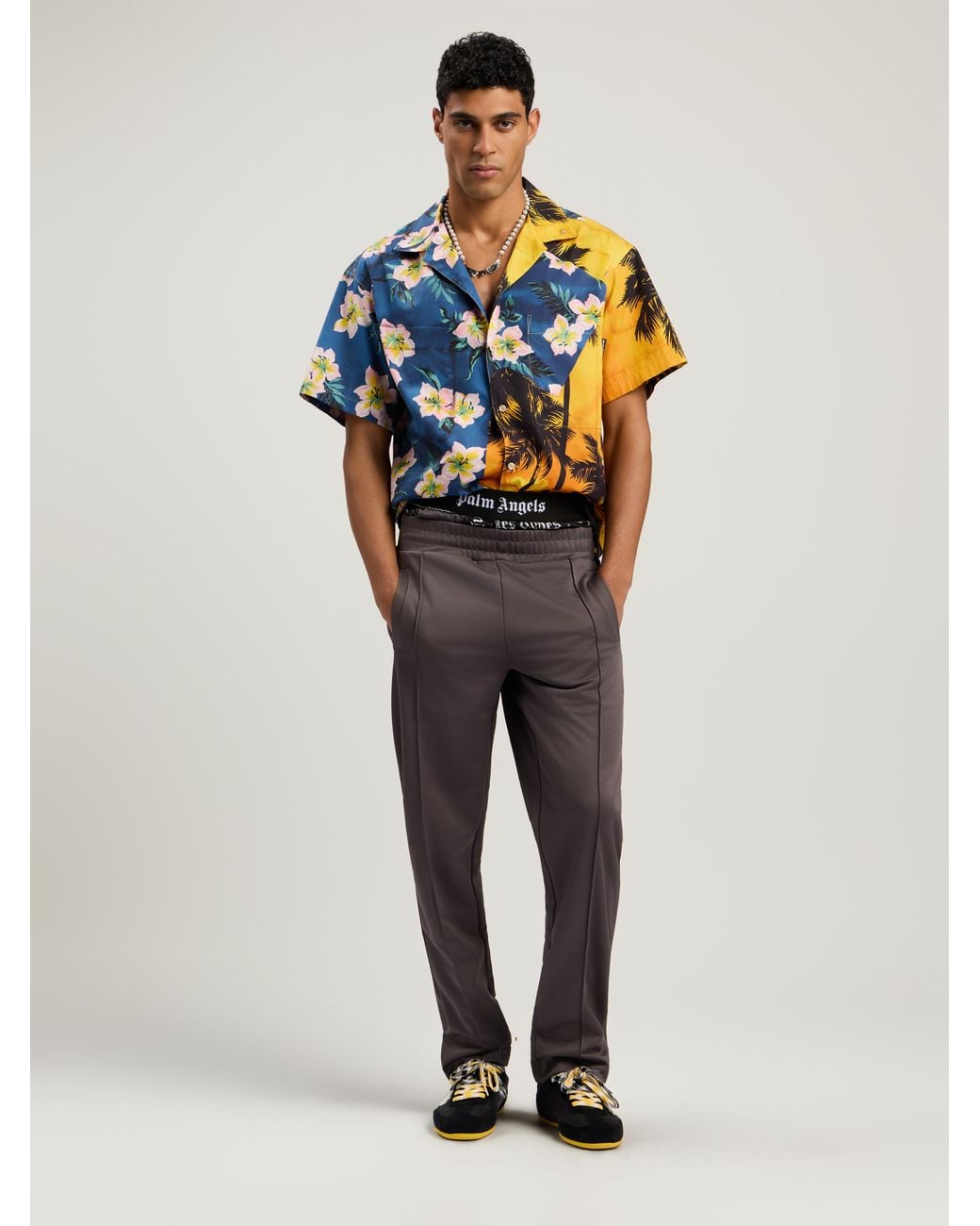 Palm Angels Blue Curved Logo Track Pants Dark for men