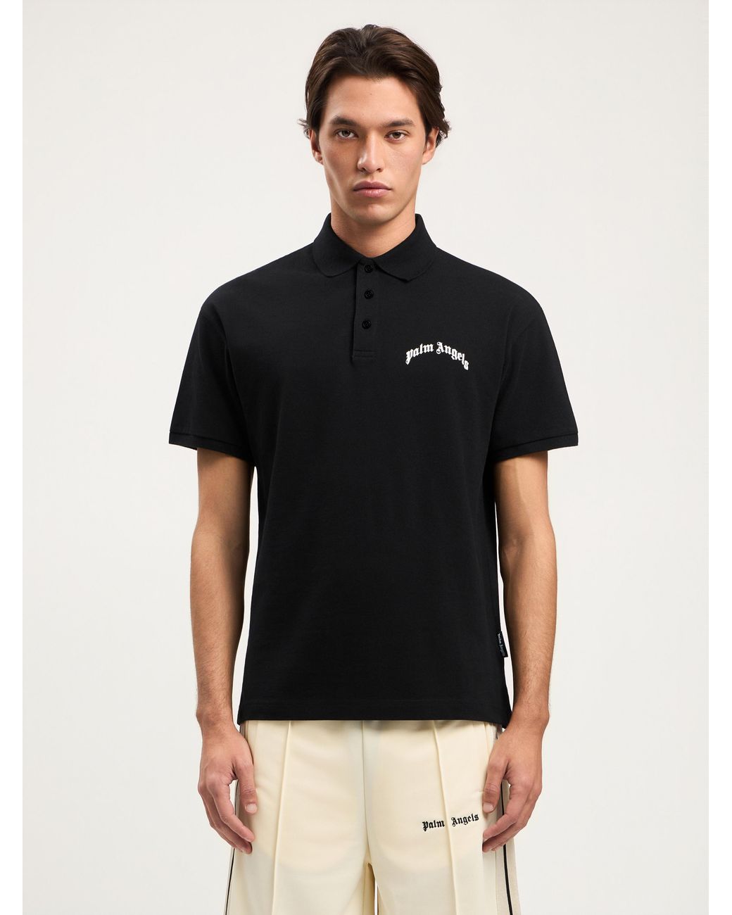 Palm Angels Black Curved Logo Polo Shirt for men
