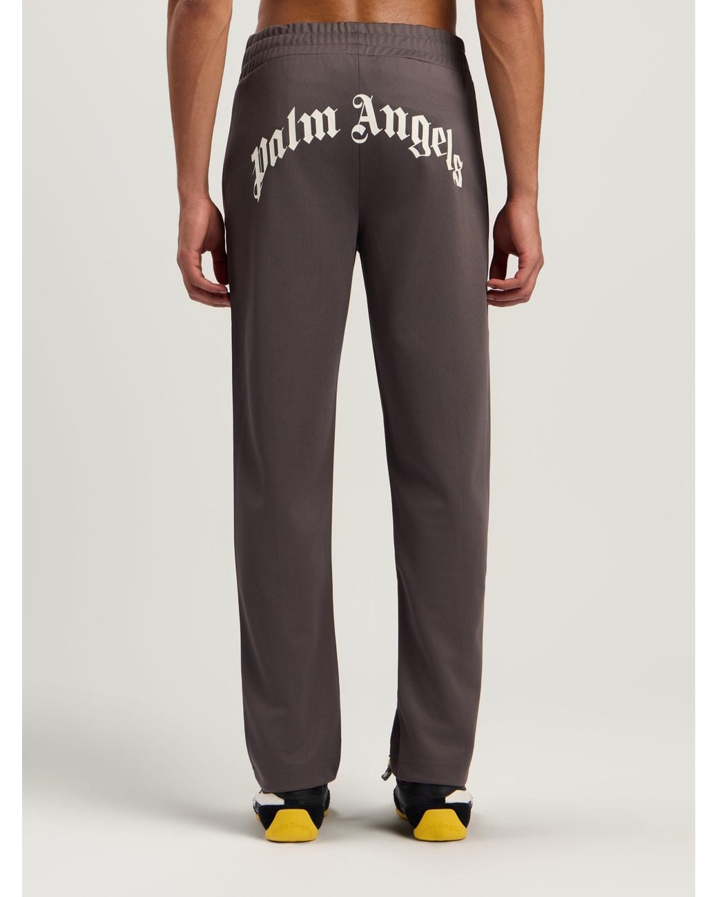 Palm Angels Blue Curved Logo Track Pants Dark for men
