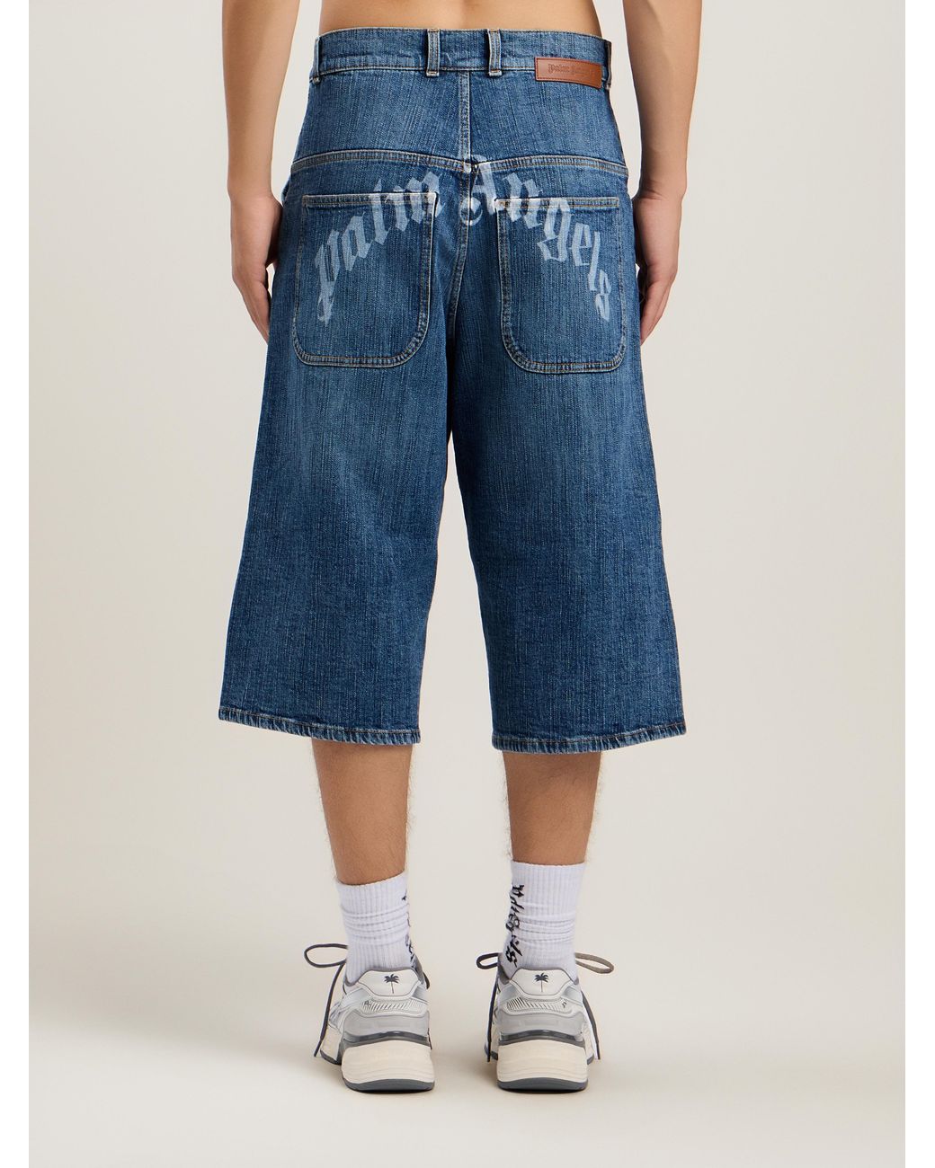 Palm Angels Blue Curved Logo Skater Shorts for men