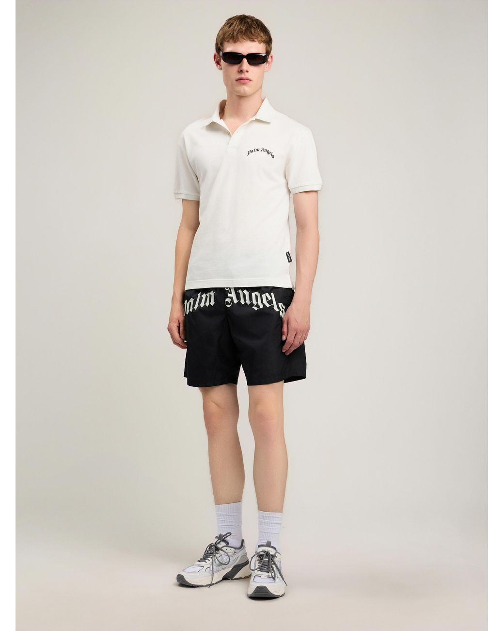 Palm Angels Black Curved Logo Swimshorts for men