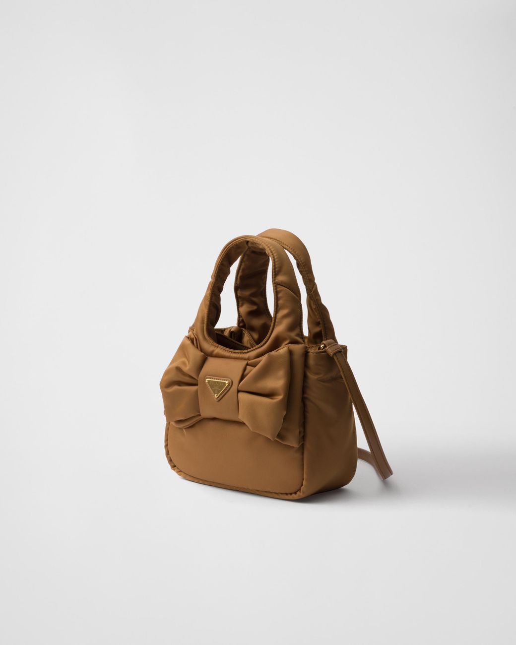 Prada Padded Re-Nylon Mini-Bag With Bow | Lyst