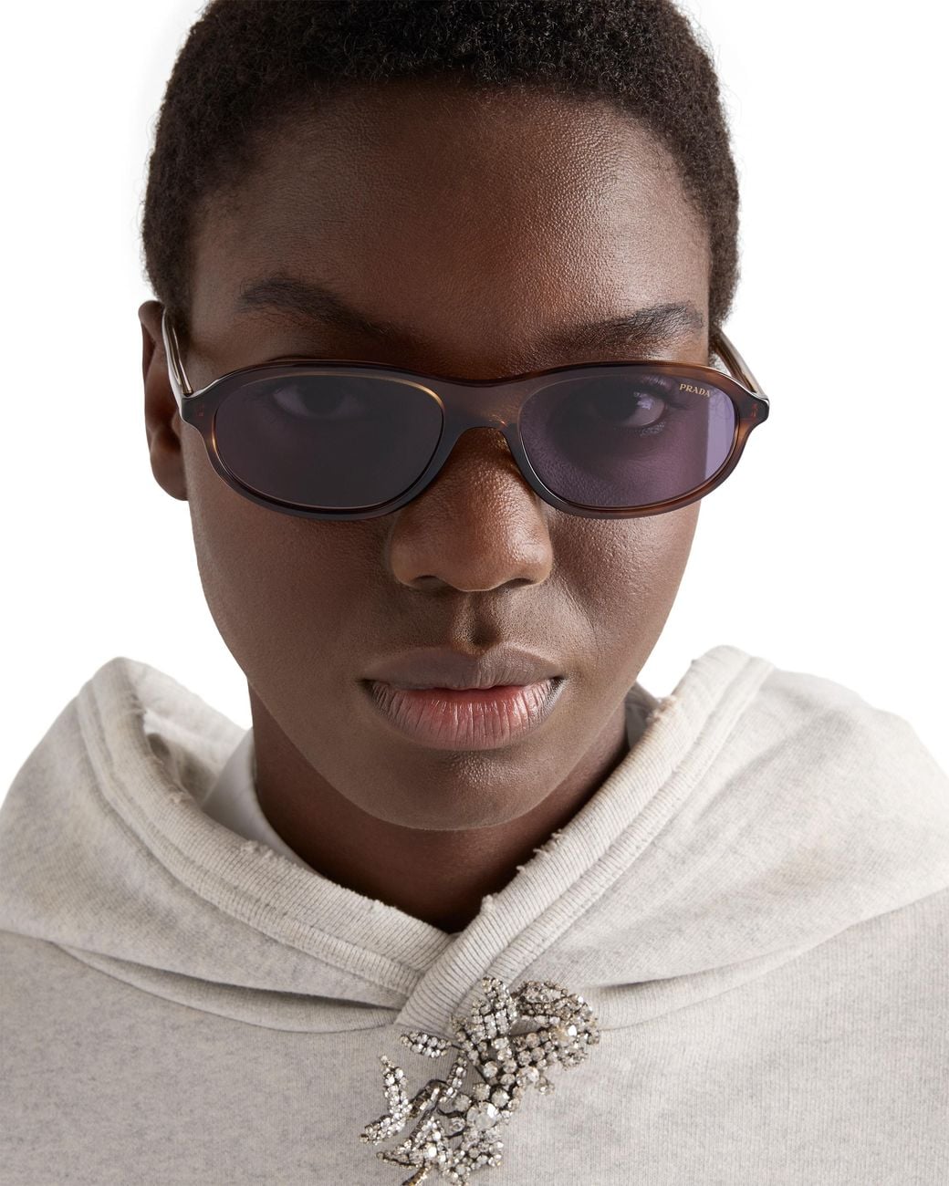 Prada Purple Sunglasses With The Iconic Metal Plaque