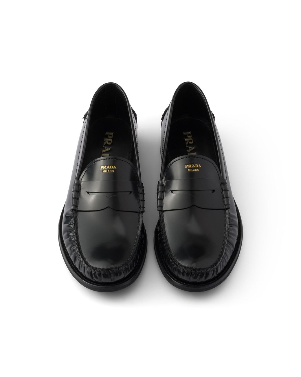 Prada Black Leather Moc Toe Loafers for men