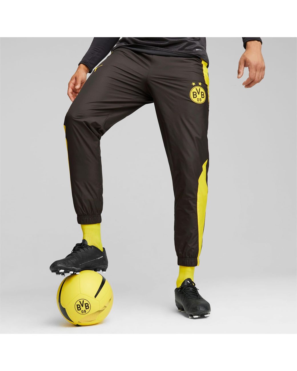 Pantalones Fútbol Borussia Dortmund Prepartido PUMA de hombre de color Negro | Lyst