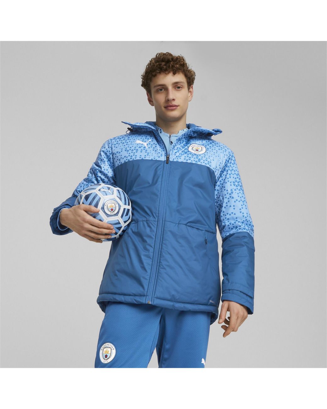 PUMA Manchester City Football Graphic Winter Jacket in Blue for Men Lyst