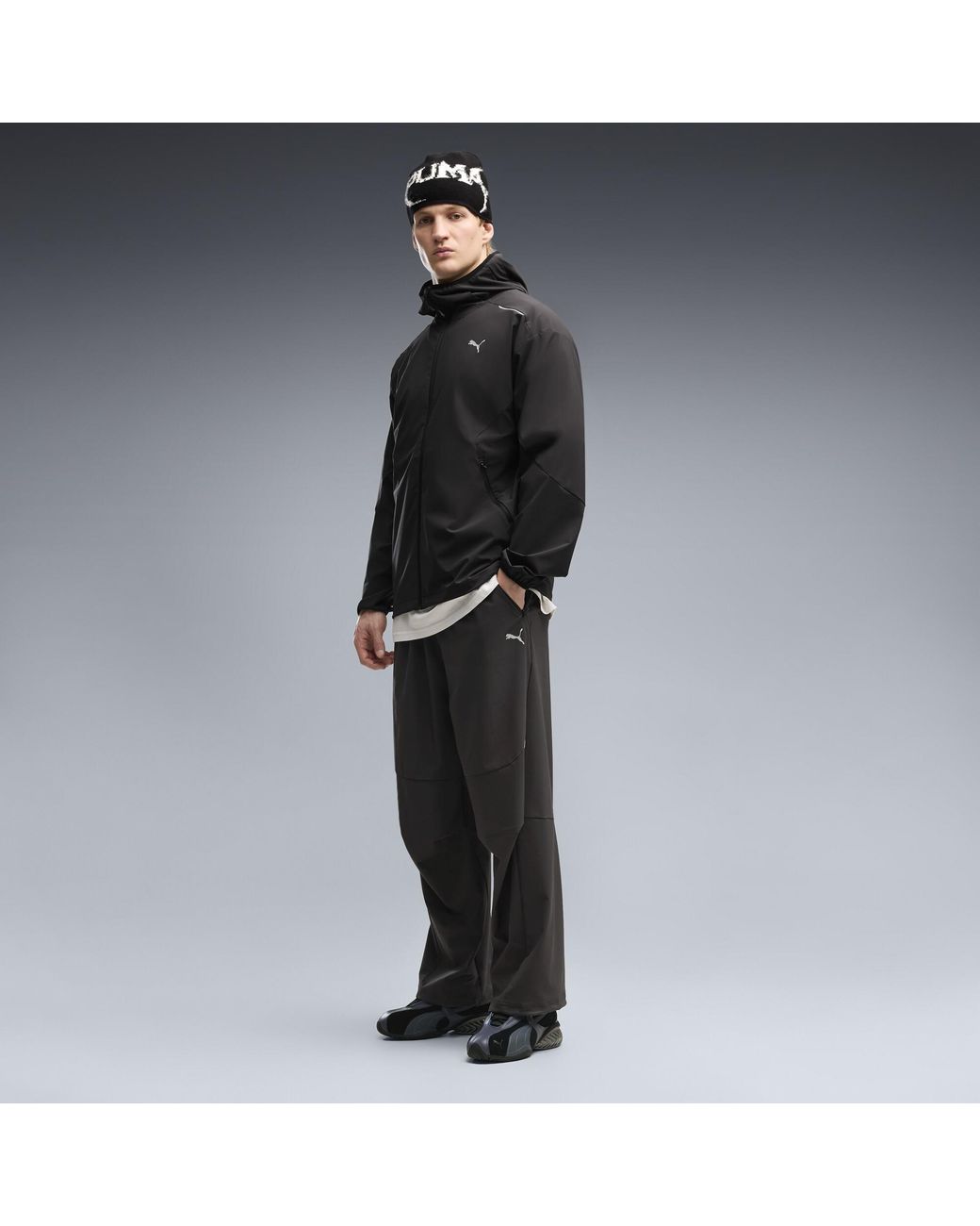 PUMA Black Tech 4-Way Stretch Track Pants for men