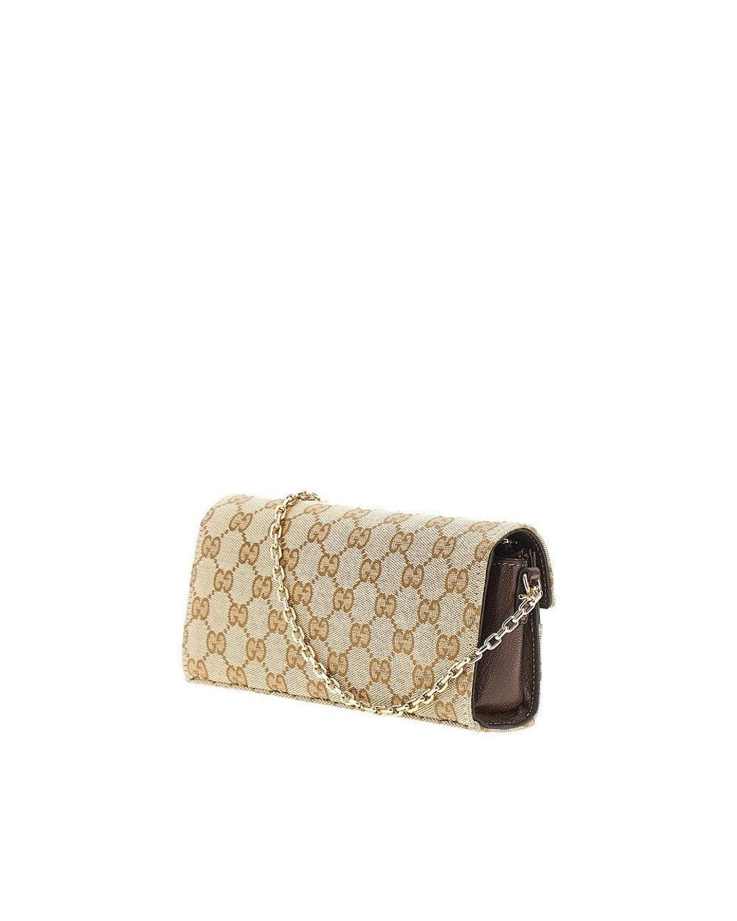 Gucci Metallic Gg Canvas Clutch With Horsebit Detail