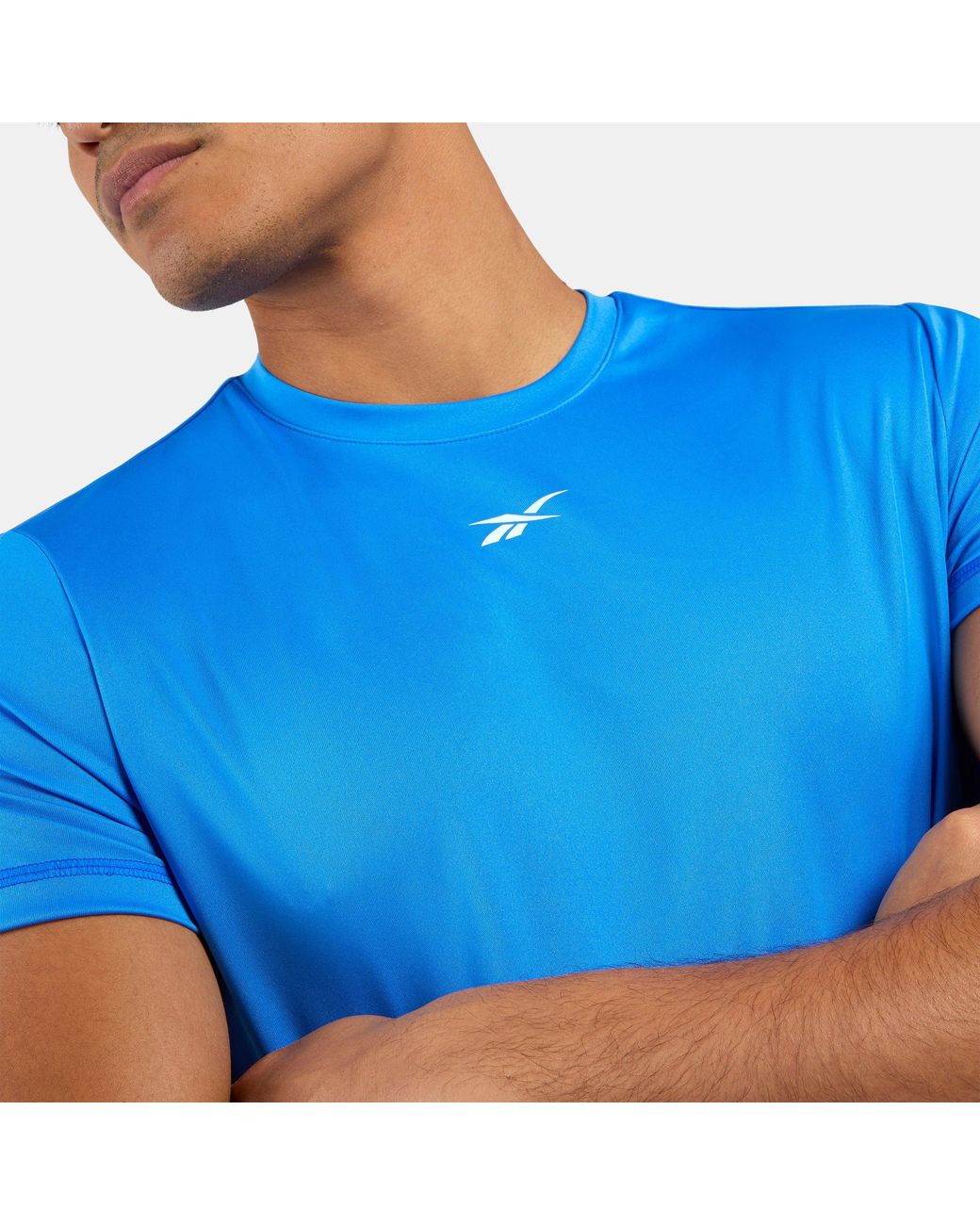 Reebok Id Train Ss Tech Tee, Afmeting in het Blue voor heren