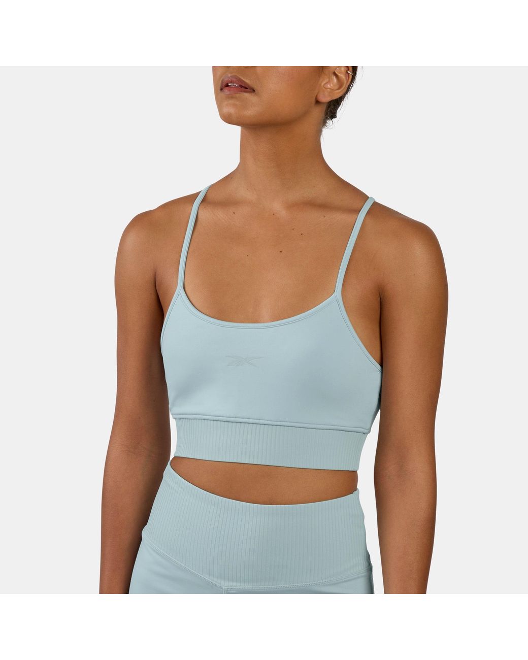 Reebok Blue Lux Peached Strappy Sports Bra