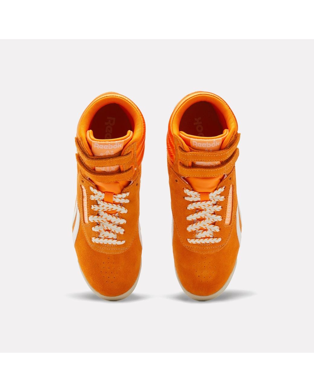 Reebok Orange Freestyle Hi Trainers