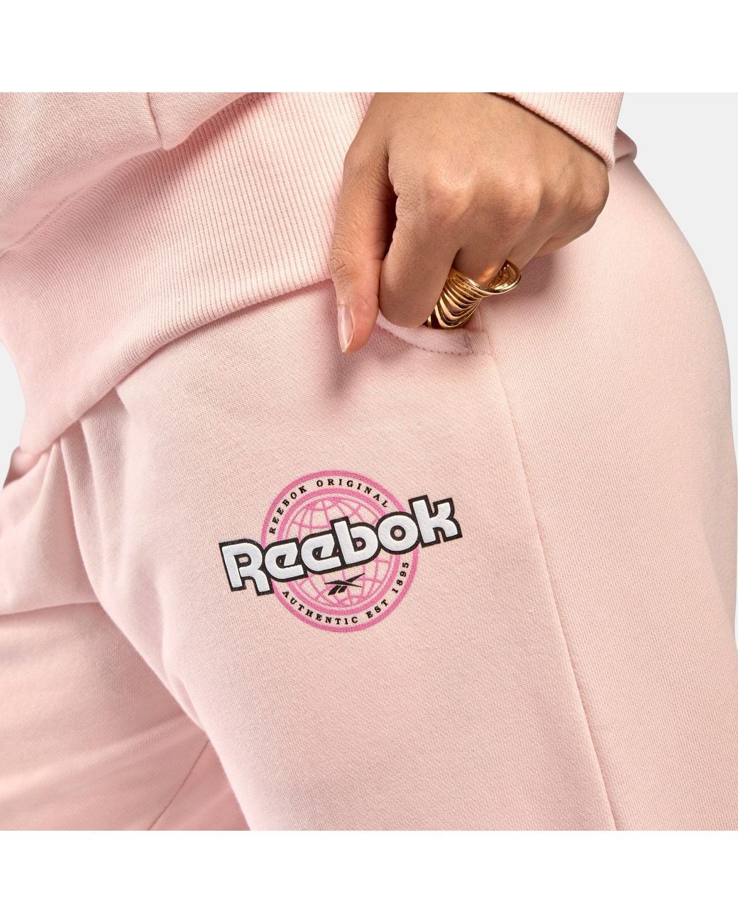 Pantalones World Tamaño Reebok de color Pink