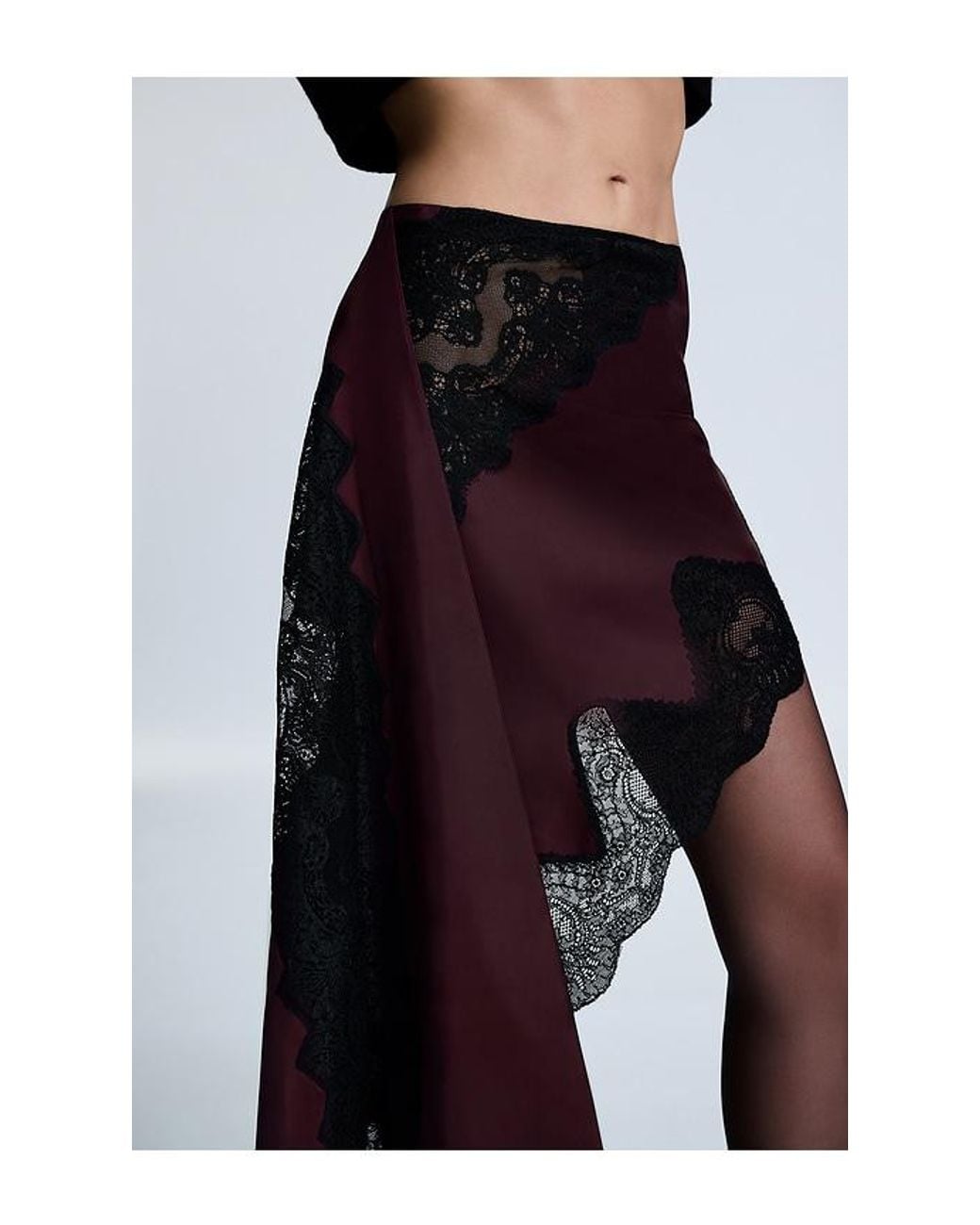 REVOLVE LOS ANGELES Black Roseline Asymmetric Skirt