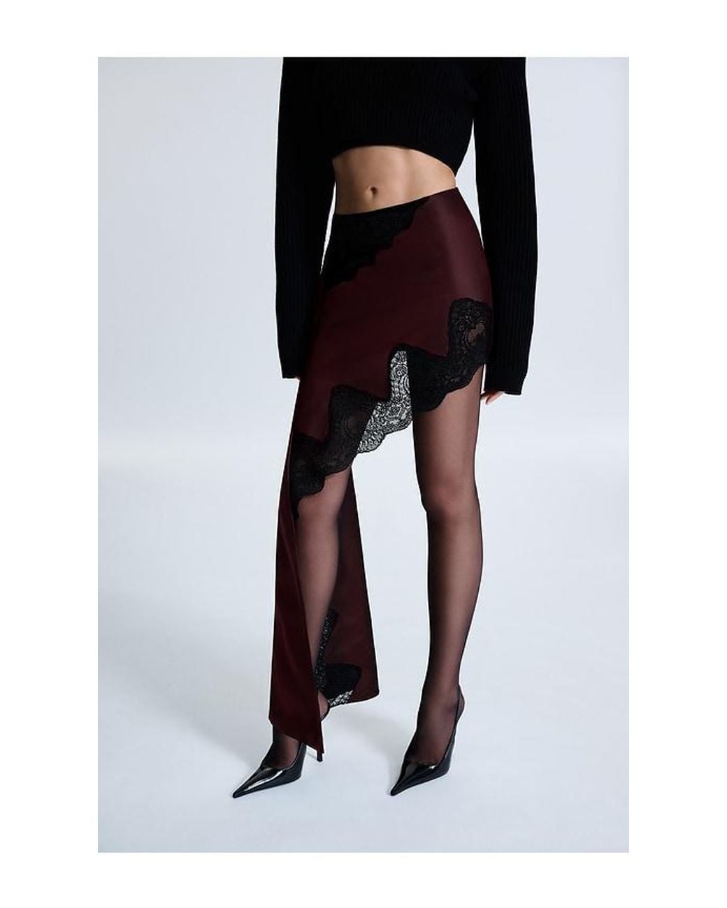 REVOLVE LOS ANGELES Black Roseline Asymmetric Skirt