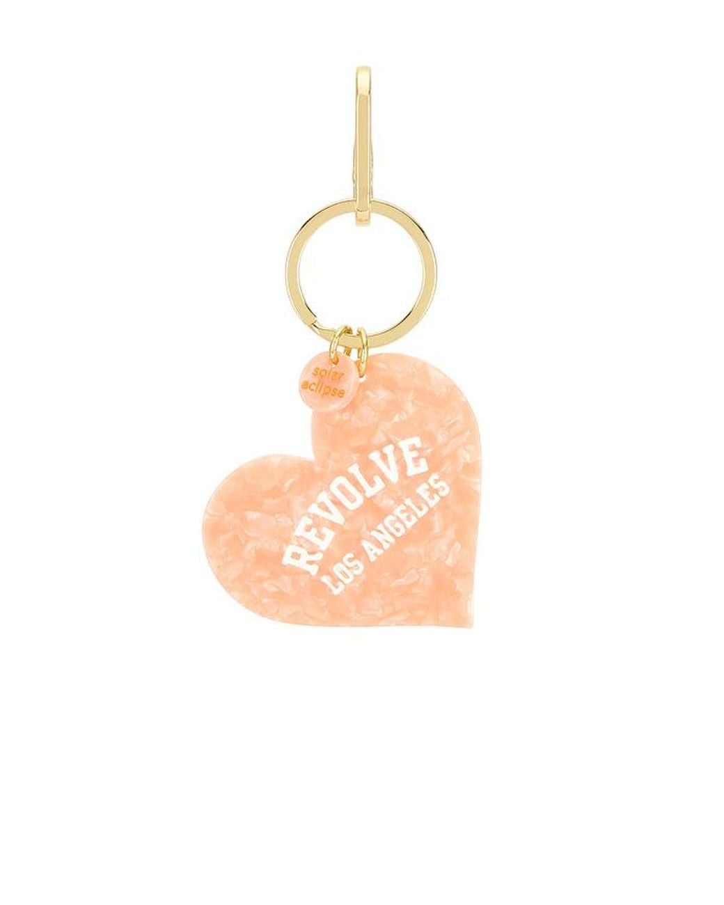 Llavero Revolve Los Angeles Collegiate Heart Bag Charm En Color Rosado Talla Solar Eclipse de color White