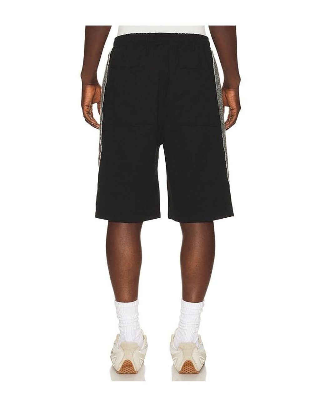 JUNGLES Black Knit Panel Shorts for men