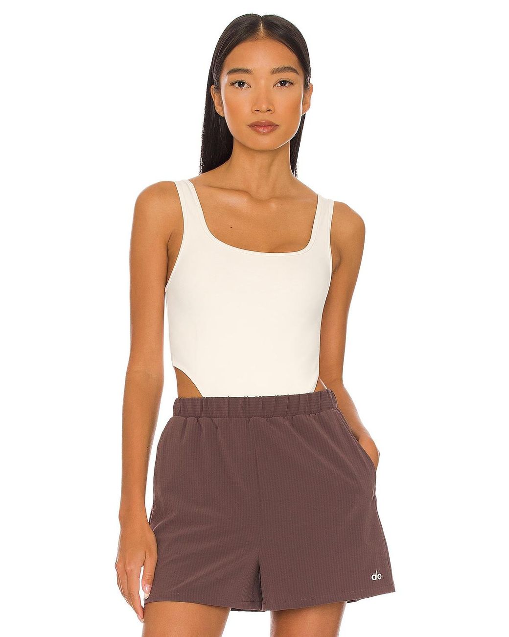 Alo Yoga Synthetic Airbrush Hot Shot Bodysuit in Ivory (White) Lyst