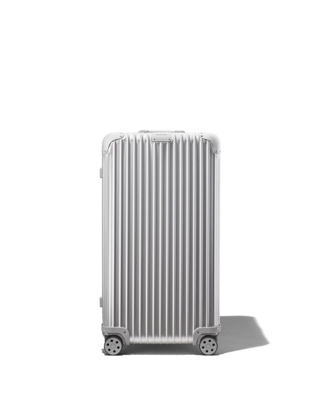 rimowa gold suitcase