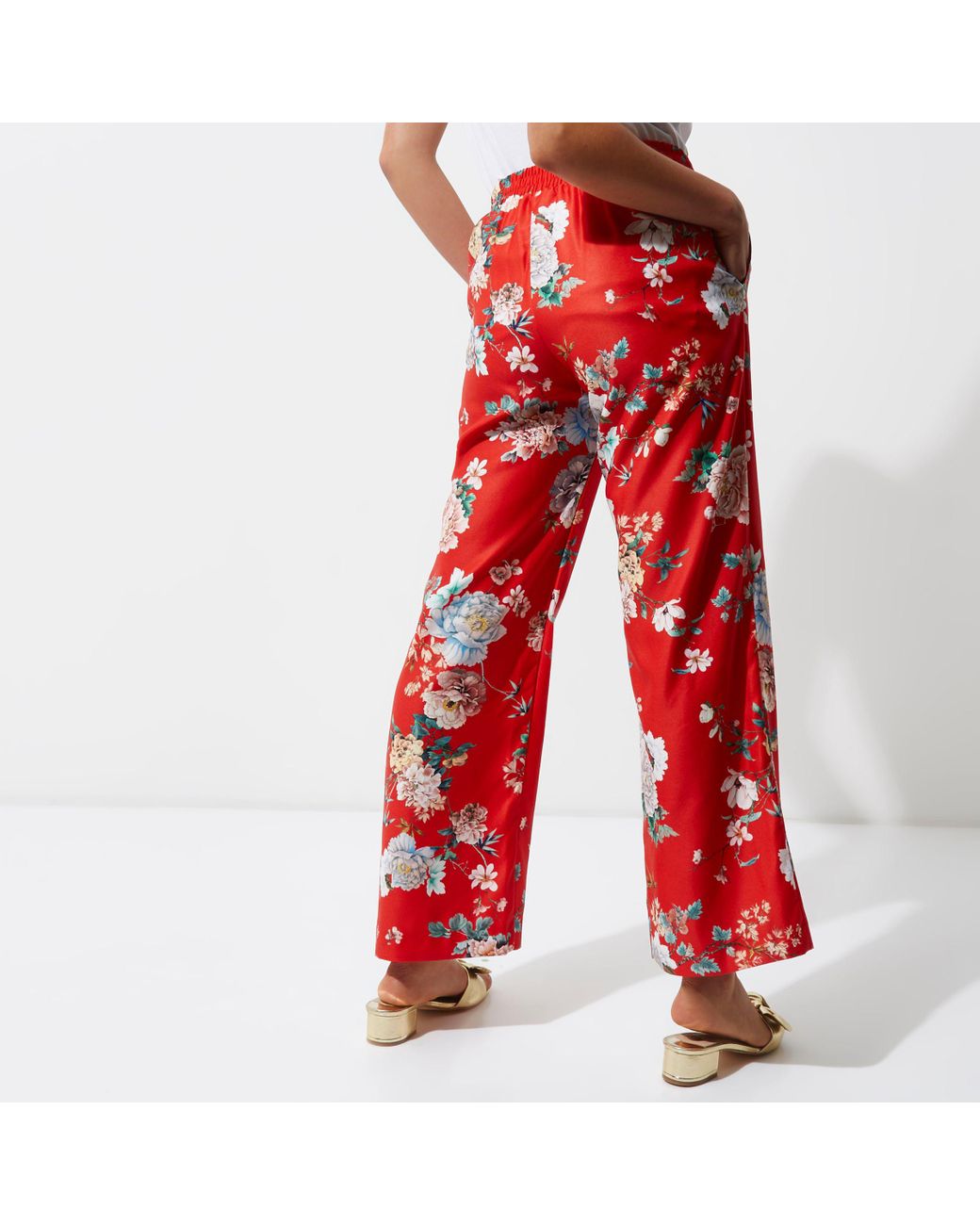 Women Red  Pink Floral Printed HighRise Waist WrinkleFree SlipOn Flared  Regular Trousers  Berrylush