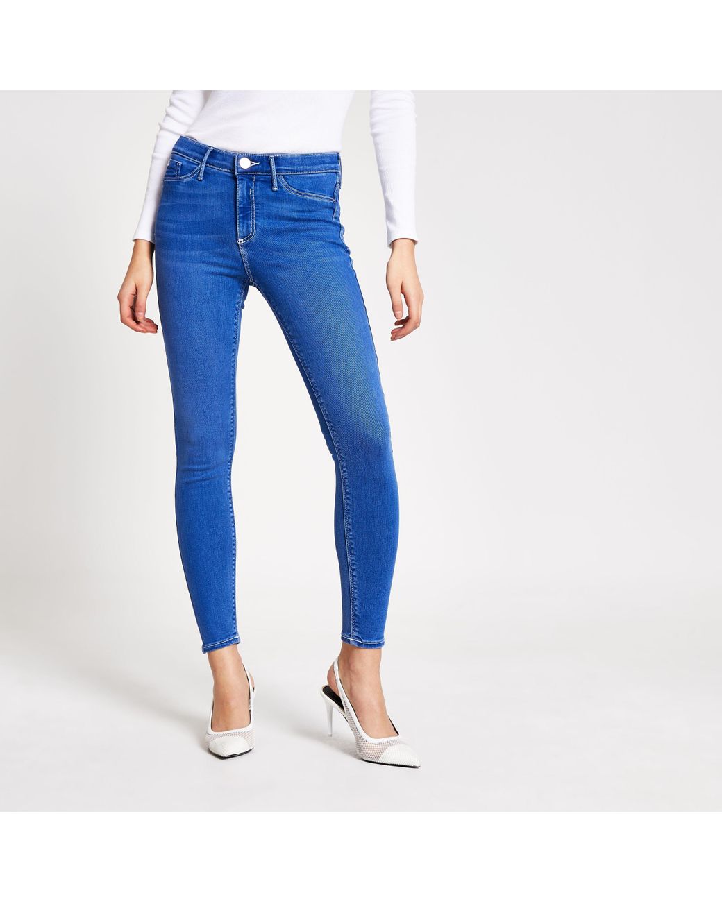 River Island Bright Blue Molly Mid Rise jeggings | Lyst Canada